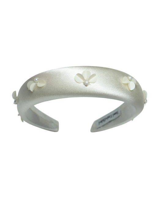 Luxurious ivory satin padded headband, hand-embellished with dimensional sequin flowers and silver-capped pearls. Front three-quarter view showing the intricate craftsmanship and comfort padding.